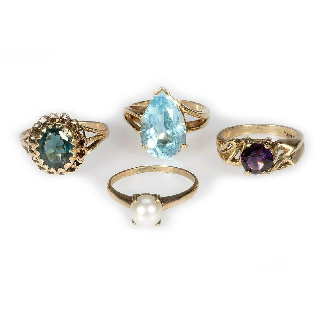 Four gem-set and 14k gold rings (1 of 3)