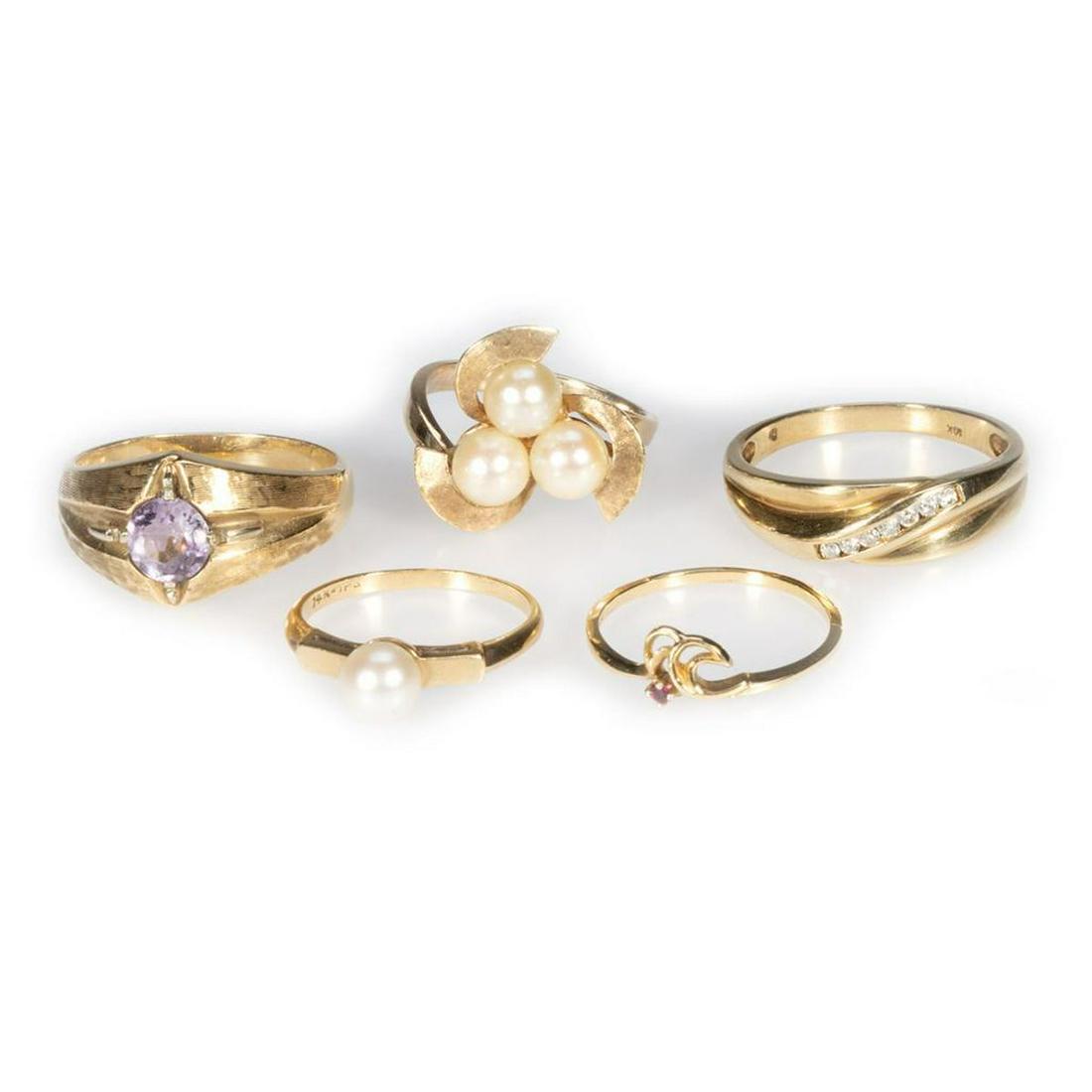 Five gem-set and 14k gold rings (1 of 4)