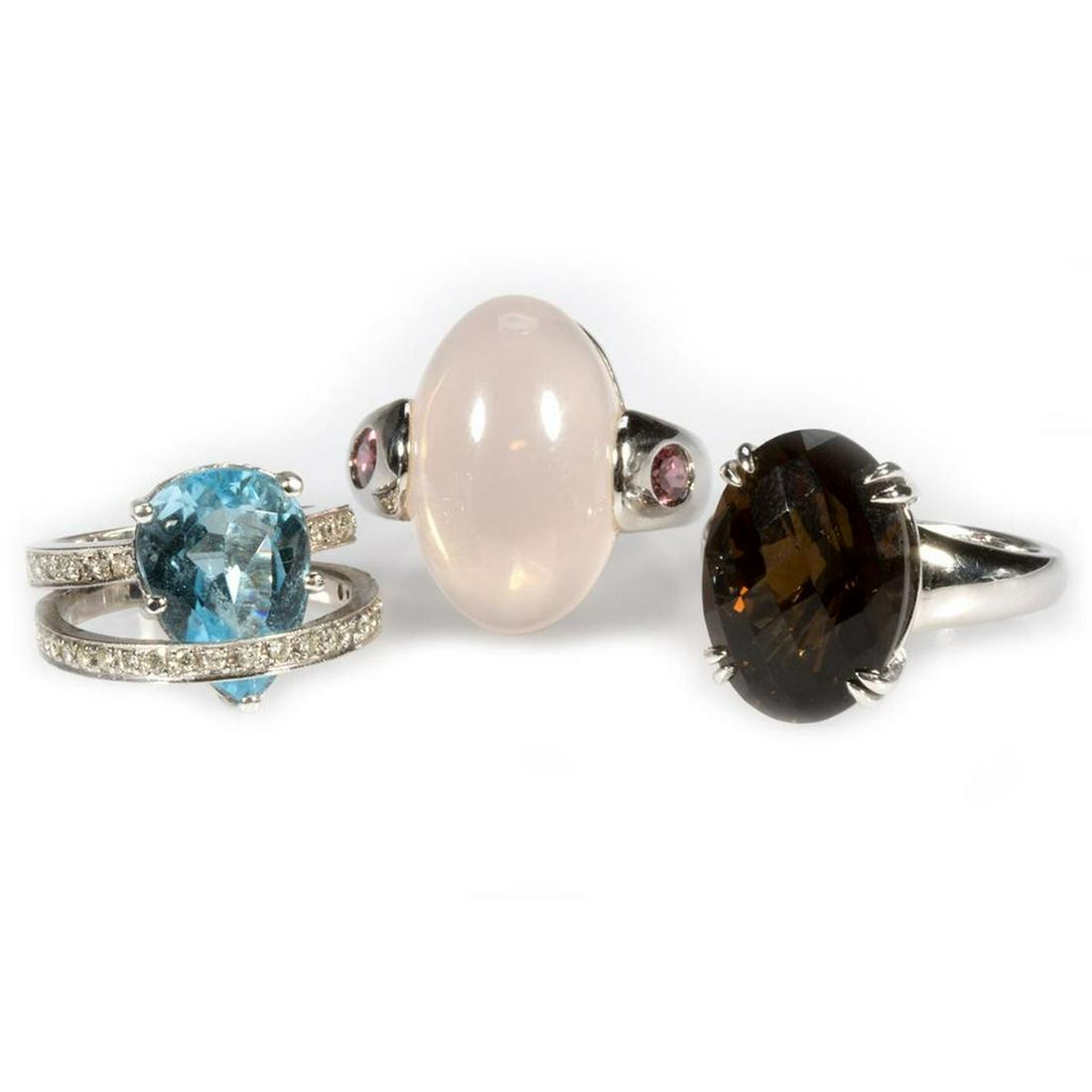 Three gem-set, diamond and 14k white gold rings (1 of 3)