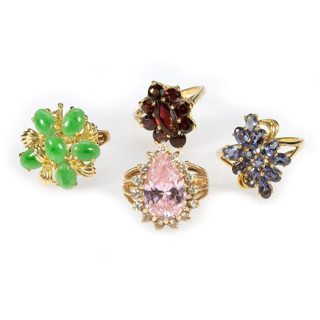 Four gem-set and 14k gold rings (1 of 2)