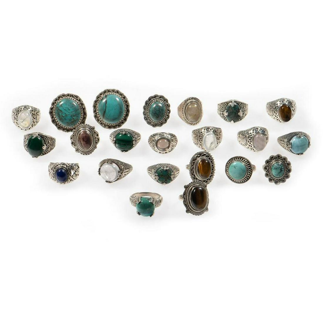 Collection of 22 stone-set and silver rings: including turquoise, tiger's eye, quartz, lapis, moonstone, and malachite; gross weight approximately 203 grams