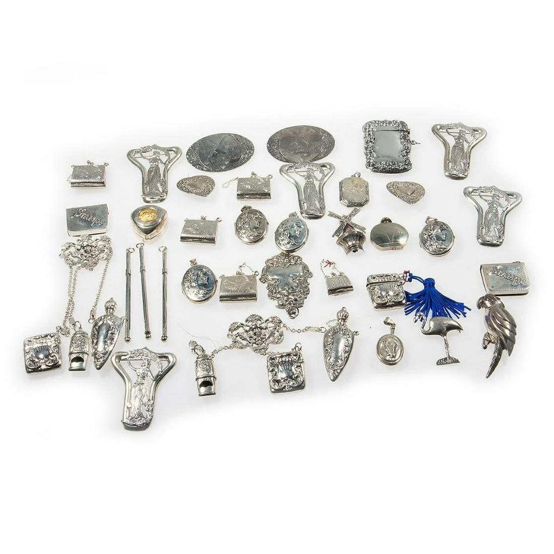 Collection of silver jewelry and objects (1 of 6)