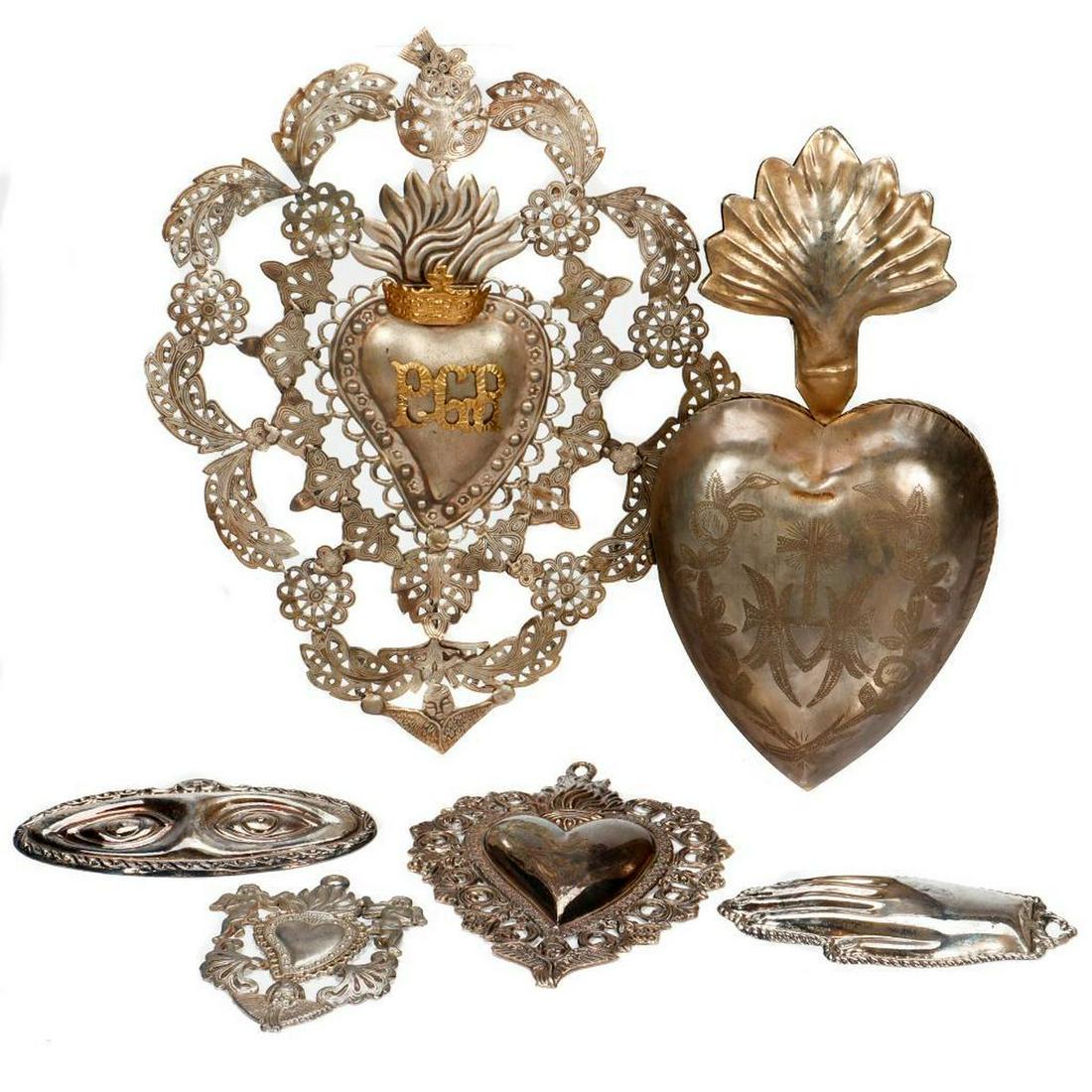 Collection of Sacred Hearts and Other Plaques (6): Consisting of a large hinged-front heart, three heart plaques, a hand, and eyes. Ranging from 4in. to 12in. long.