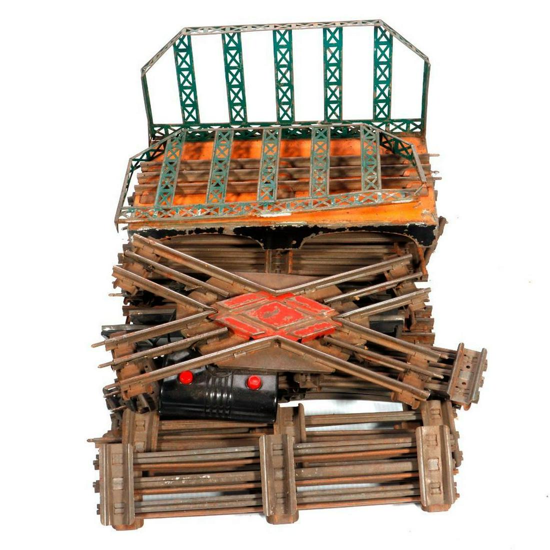 Lnl & other Prewar Trk: 16 Crv, 13 Str, 6 Clips, Dorfan Bridge: Lionel Prewar Track: 16 Curve 13 Straight 6 clips to hold track sections together 2 UTC Lockon RCS with buttons but base of track section has missing corner 0-27 RCS All are dirty with rust spots. Oth