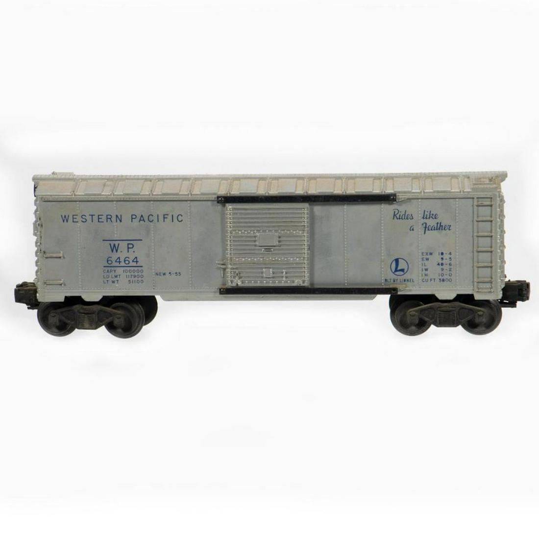 Lionel 6464-1 Silver Western Pacific Box Car: Lionel Post War Silver Western Pacific Box Car, Blue Lettering. Roof walk ends, brake wheel, doors, door guides, trucks and couplers intact. Dusty.