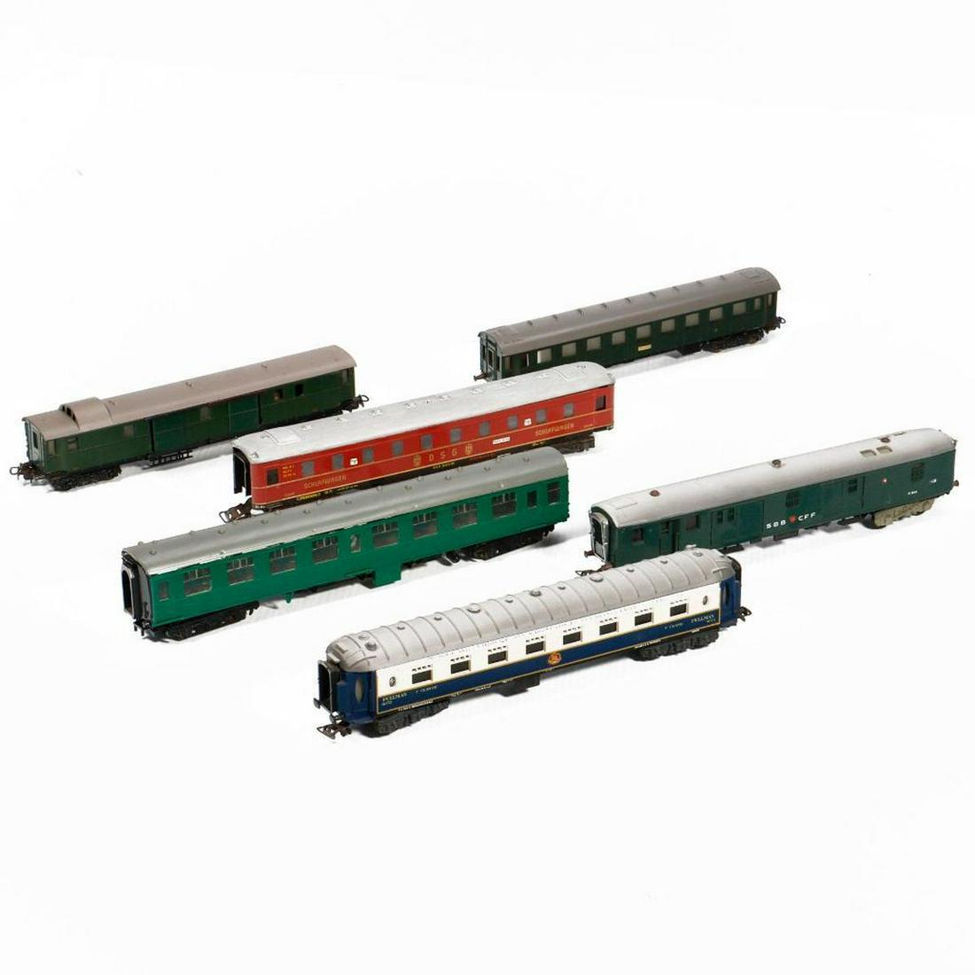 European Prototype Passenger Cars. HO gauge.: 6 European Prototype Passenger Cars. HO gauge. 1. Green plastic body with black chassis and gray roof. Chassis says Kitmaster, Rosebud, Made inn England. Trucks intact. No couplers or buffers. Top is 