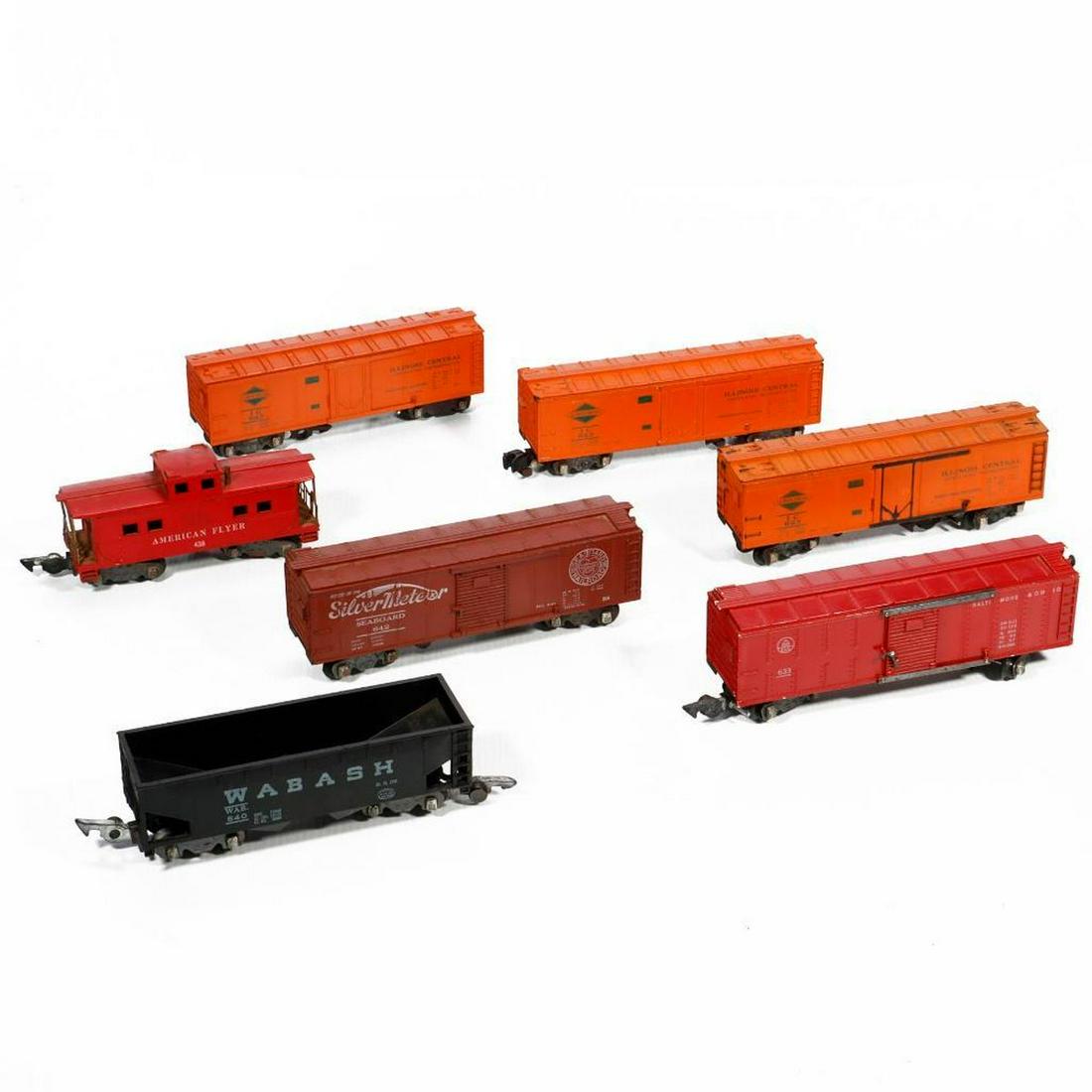13 American Flyer S Gauge Freight Cars with 3 Spring Trucks: 13 American Flyer S Gauge Freight Cars with Black Weighted Couplers and Three Spring Trucks 1. 642 Brown Seaboard Box Car. Sheet metal chassis. Roof walk ends intact. No brake wheel. Trucks and couple