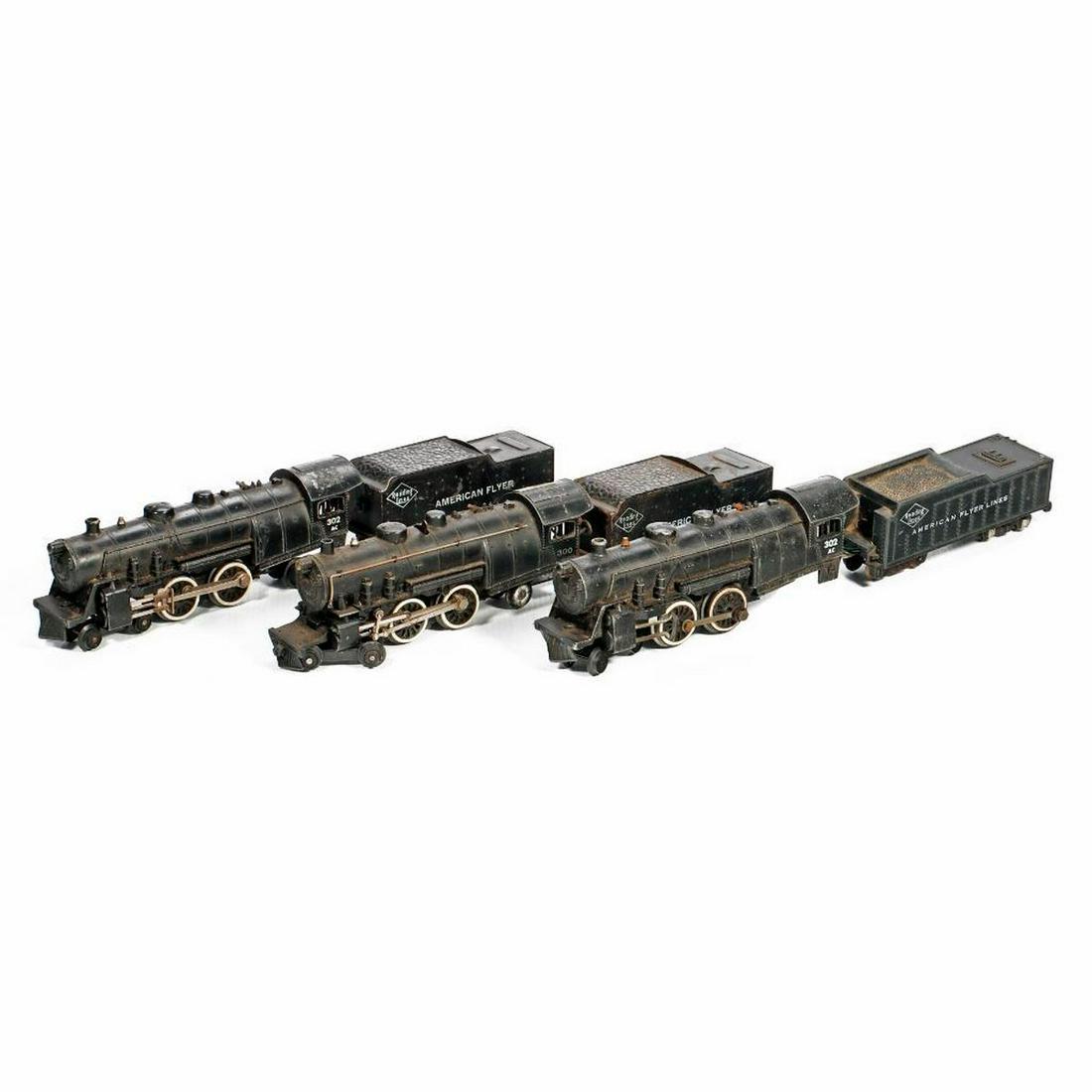 5 AF S Ga DieCast Atlantic Locos 302 AC,300,302 AC,302 AC,300 AC: 5 American Flyer S Gauge Die Cast Boiler Atlantic Locomotives for parts. 1. 302AC Reading Lines/American Flyer.Cab roof has paint loss. Sheet metal tender, trucks and black weight link coupler intact.