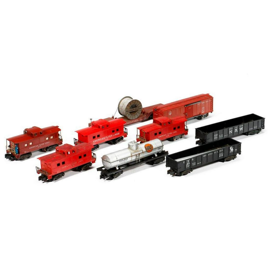 9 American Flyer S Gauge Freight Cars: 9 American Flyer S Gauge Freight Cars 1. 936 Pennsylvania depressed center flat car with Western Electric cable reel. Reel, hold down wires, steps, one brake wheel, trucks and couplers are intact. Dir