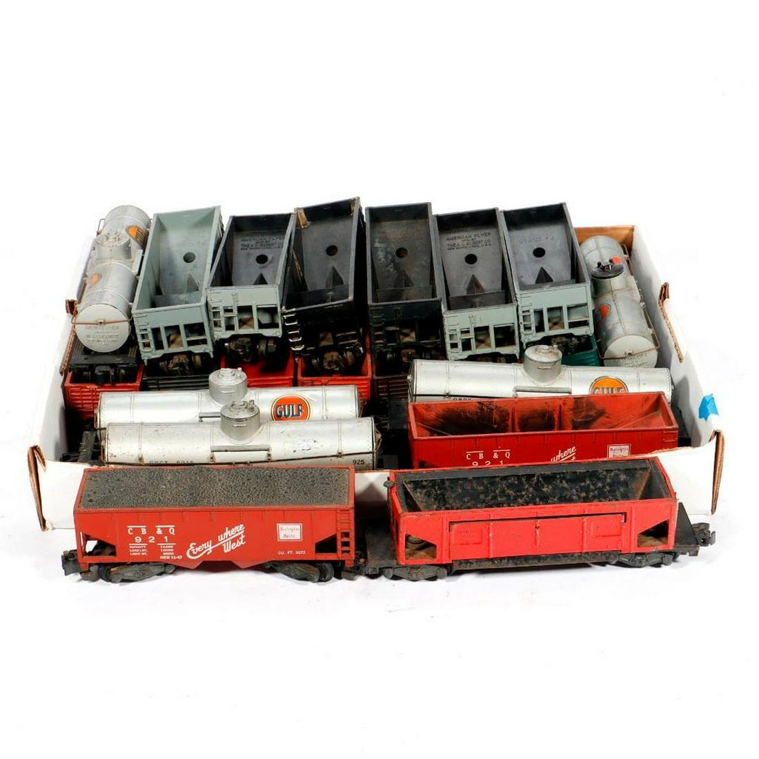 21 AF S Gauge Knuckle Coupler Freight Cars needing work.: 21 American Flyer S Gauge Knuckle Coupler Freight Cars needing work. 1. ? Hopper car repainted glossy black with silver ladders and hatches. Steps, end frames, trucks and couplers intact. Glue residue