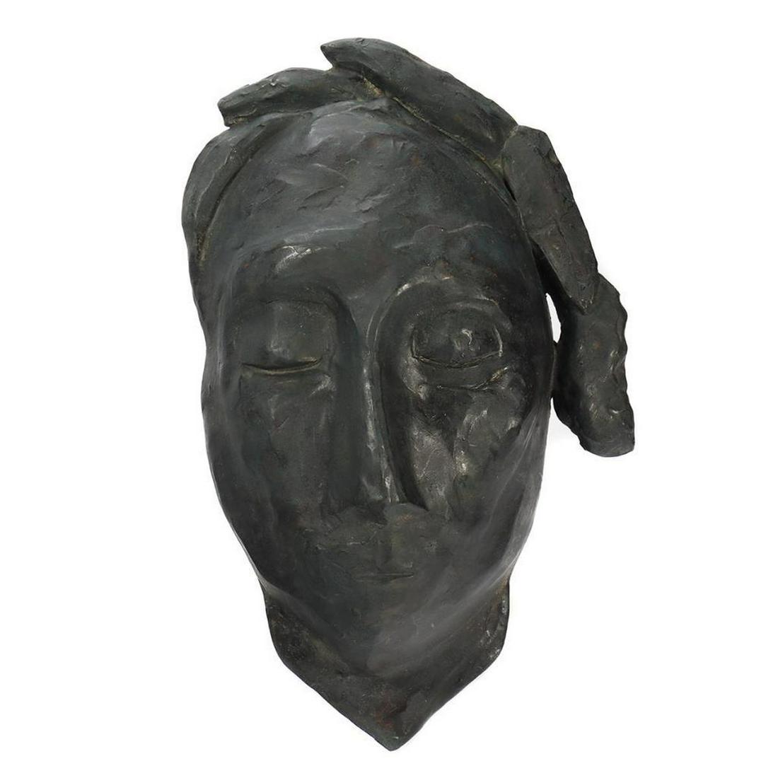 Eleen Auvil (1927 - 2022).: Artist: Eleen Auvil (1927 - 2022). Title/Subject: Elongated mask. Size: 13in. x 8in. Year Created: Undated. Signature: Unsigned. Medium/Ground: Cast bronze. Condition good. Condition Report: All lots