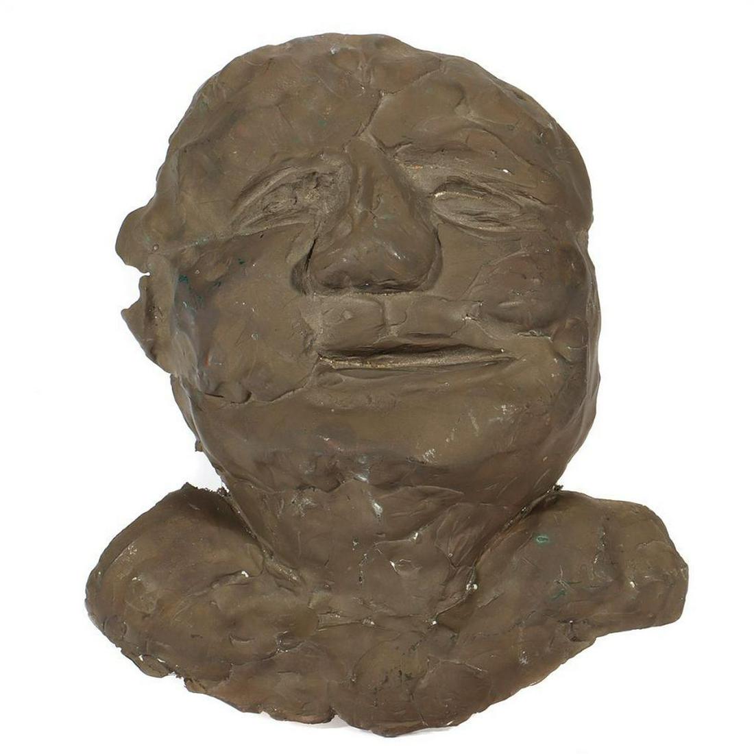 Eleen Auvil (1927 - 2022).: Artist: Eleen Auvil (1927 - 2022). Title/Subject: Smiling mask. Size: 10 1/4in. x 9in. Year Created: Undated. Signature: Unsigned. Medium/Ground: Cast bronze. Condition good. Condition Report: All lot