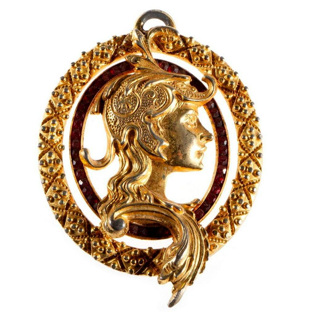 Lucien Piccard high fashion costume pendant.: Vintage, gold tone with simulated garnet; length: 3in. Condition Report: All lots are sold as is and where is. Turner Auctions + Appraisals, LLC provides condition reports upon request to aid in your
