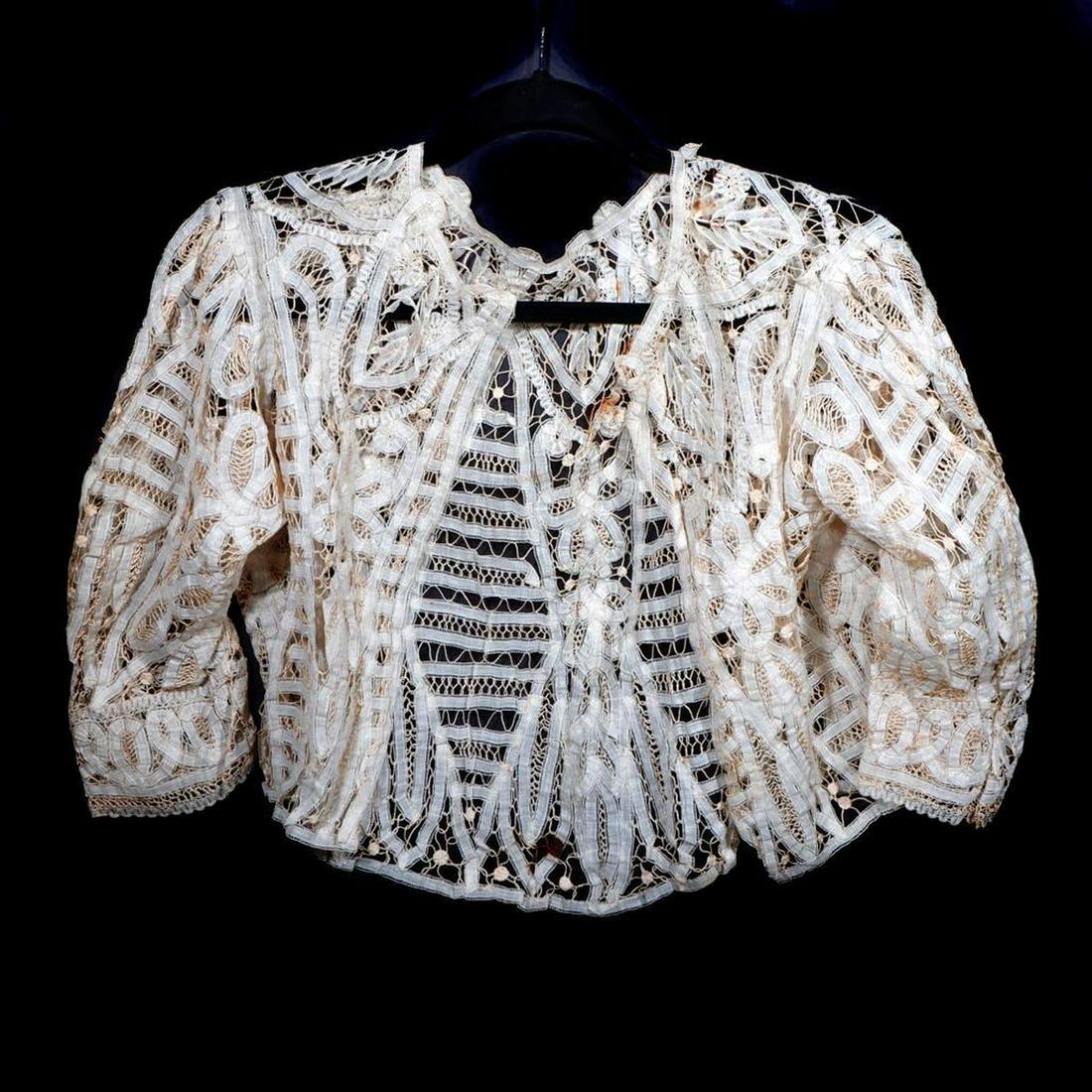 Edwardian Crochet Lace Bridal Outfit.: A crochet lace and ribbon-work bolero and separate overskirt with netting panels and train. Bolereo approx. A small/petite size: 16in at the shoulders; waist of overskirt approx. 13in. Condition: the 