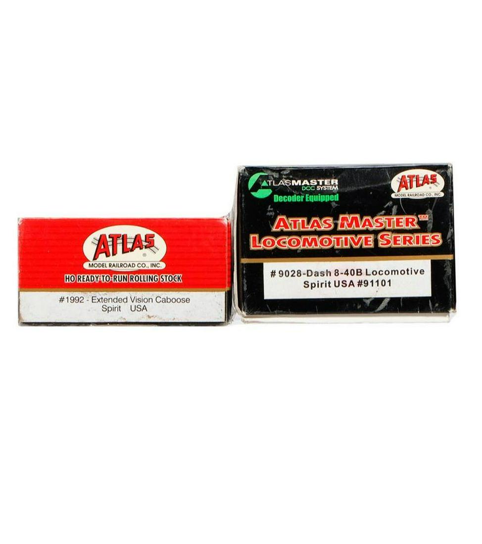 Atlas HO Spirit USA Master Locomotive Series Dash 8 40B and Caboose: Atlas HO Spirit USA Master Locomotive Series #9028-Dash 8-40B #91101 Spirit USA Extended Vision Caboose #1992 In original shelf worn packaging