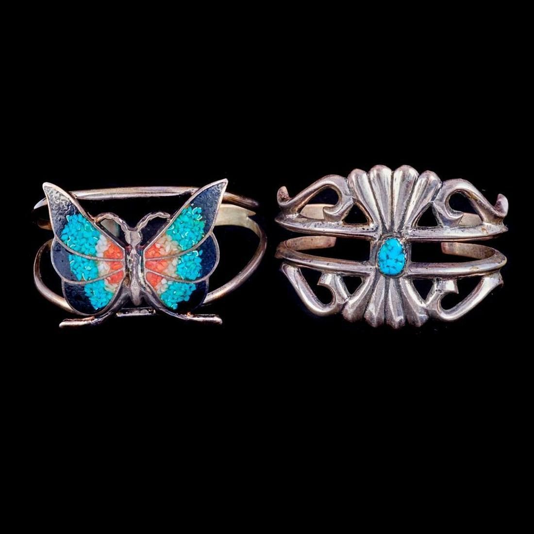 Navajo Cuff Bracelets.: Two old pawn turquoise and silver cuff bracelets. Largest example is approx.: 1 1/2 inches wide. Approx. size: 6 and 6 1/4 inches, which includes the additional wrist gap. Approx. total weight: 82 g.