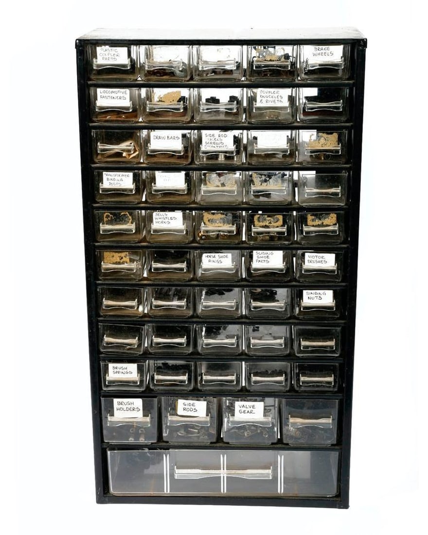 Lionel Service Man Postwar Parts Drawers: Lionel Service Man Parts Drawers 50 Drawer Parts Cabinet with: Plastic Coupler Parts Truck Pickup Contacts Transformer Graphite Rollers and Pins Caboose Ladders and Stack Brake Wheels Locomotive Speci