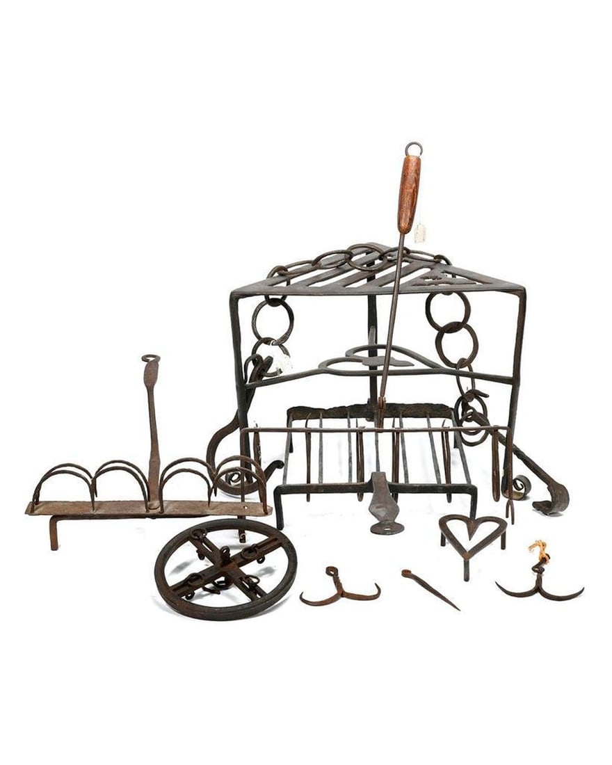 Group of Iron Fireplace Instruments.: 18th/19th Century. Consisting of a warming stand, pot hooks, toaster, trivel, fireplace hooks.