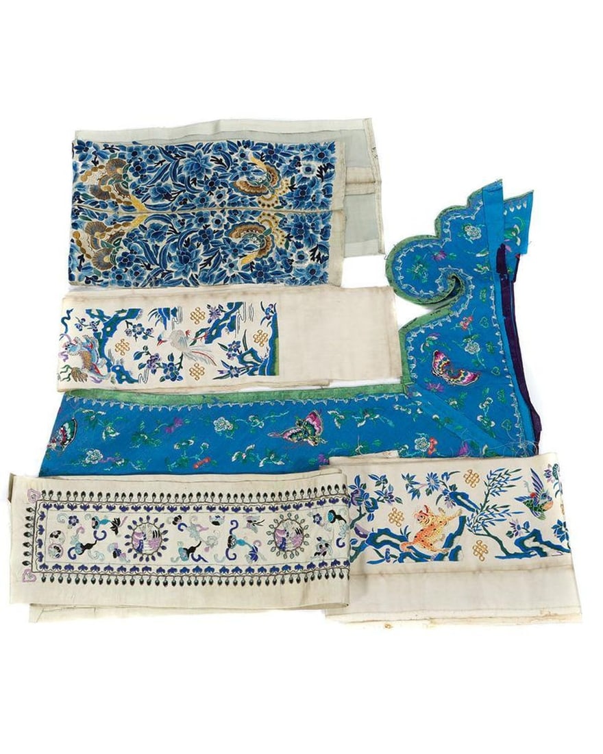 Collection of Chinese Embroidered Silk Sleeve/Cuff Panels.: Including three sets of finely embroidered panels (one set sewn together; one tacked together), including butterfly, fu dog, crane, and peacock motifs; and a blue silk butterfly embroidered garment tr