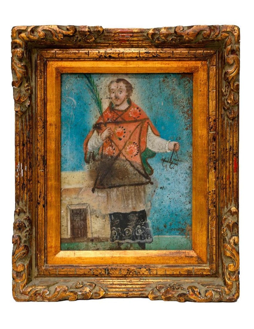 A Mexican Retablo of a Saint, framed. (1 of 2)