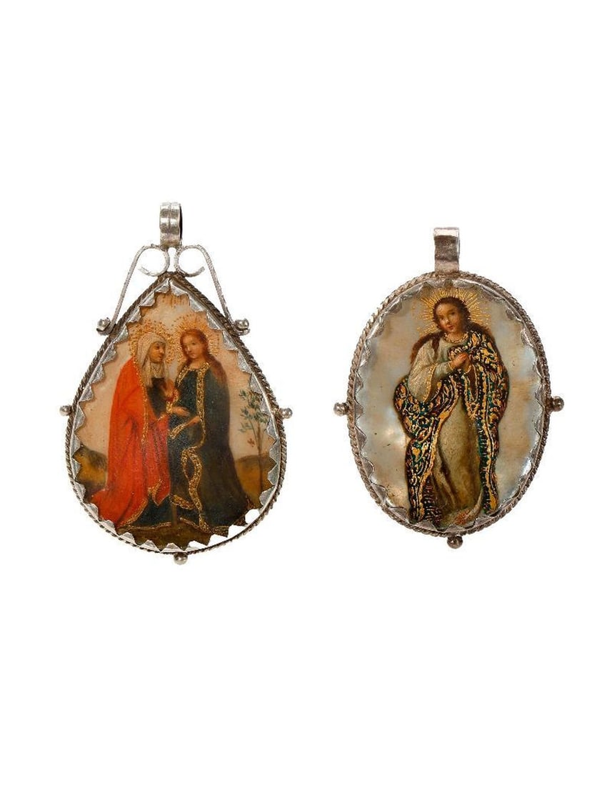 Two Mother-of-Pearl Relicario Medallions of the Virgin.: 20th Century, South American. Two silver metal relicario medallion miniature paintings on mother-of-pearl, one tear-drop-shaped, depicting the Virgin with Saint Mary Magdalene (2 3/8" L total); the ot