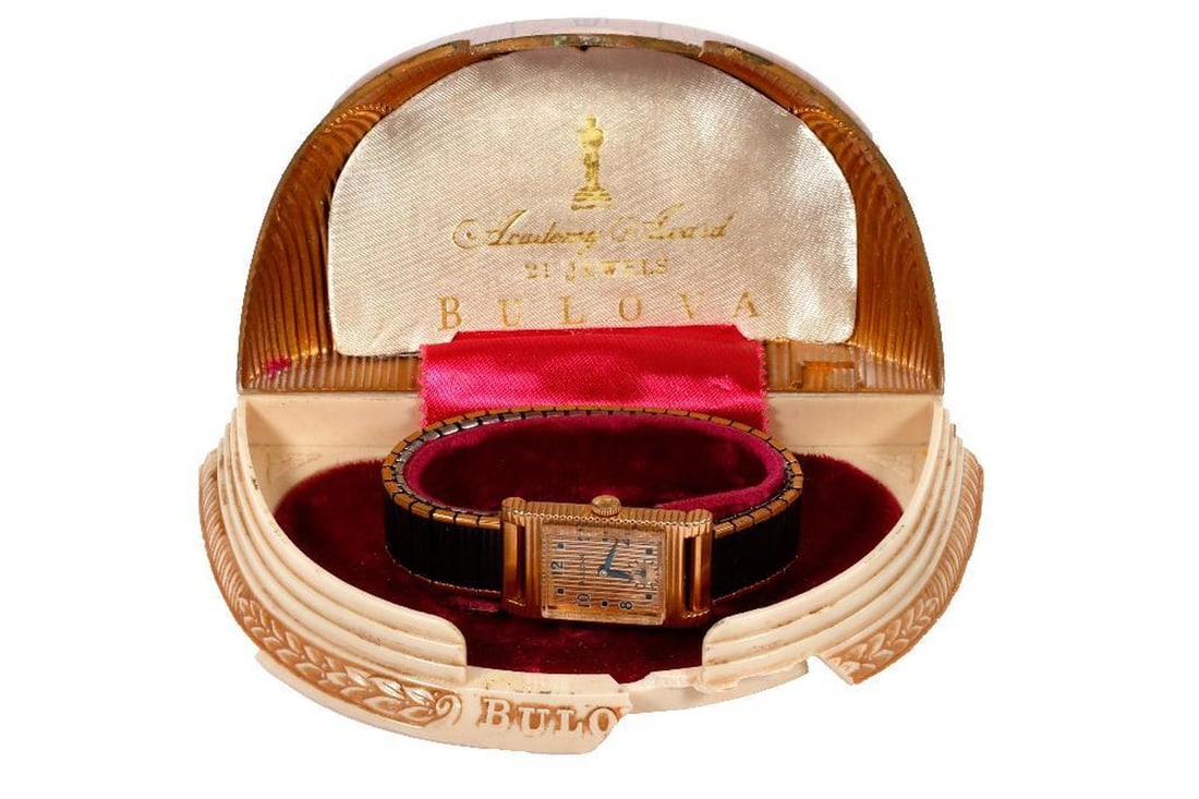 Vintage 1950's Bulova Academy Award Watch with Case: Vintage 1950's BulovaAcademy Award 10k Gold Filled Watch With Case. Note: Case Has Damage. NOTE: Watch was running prior to auction, all watches are sold as is regardless of functionality. Please exam