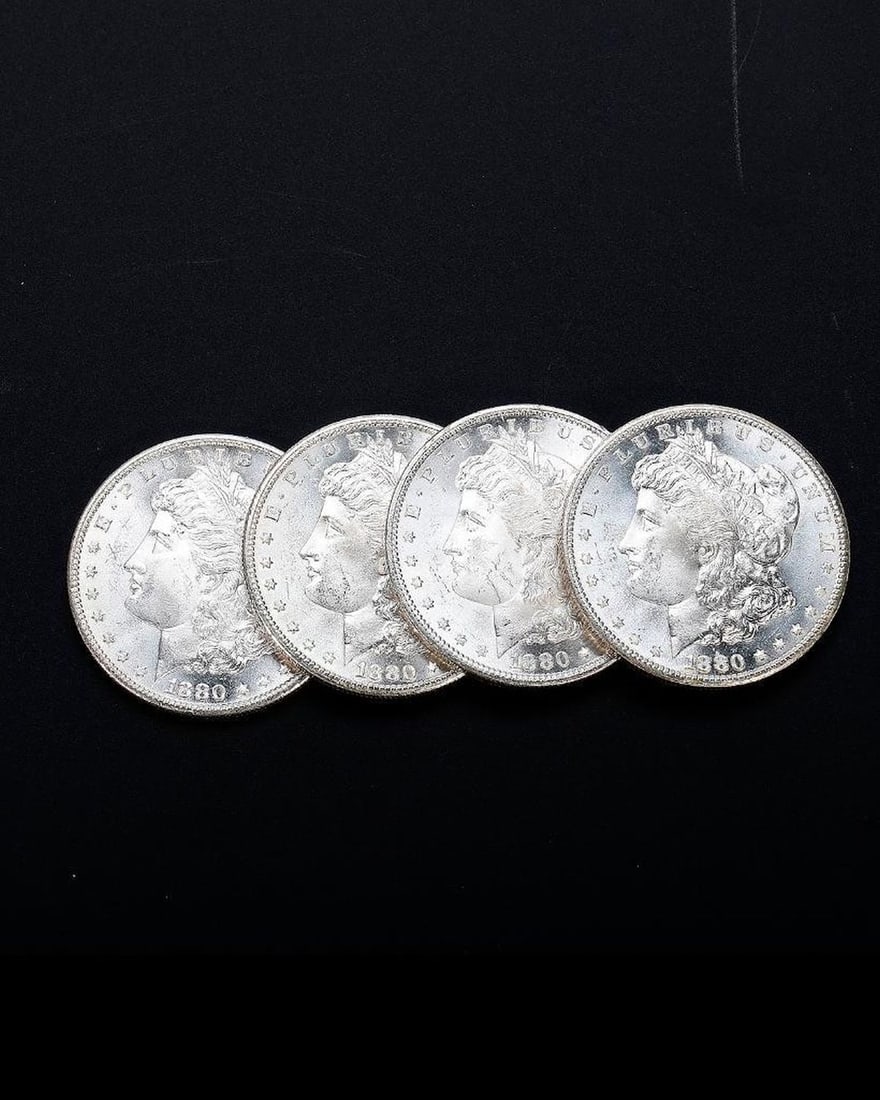 A Set of Four American Uncirculated Morgan Silver Dollar Coins issued 1880-S (1 of 2)
