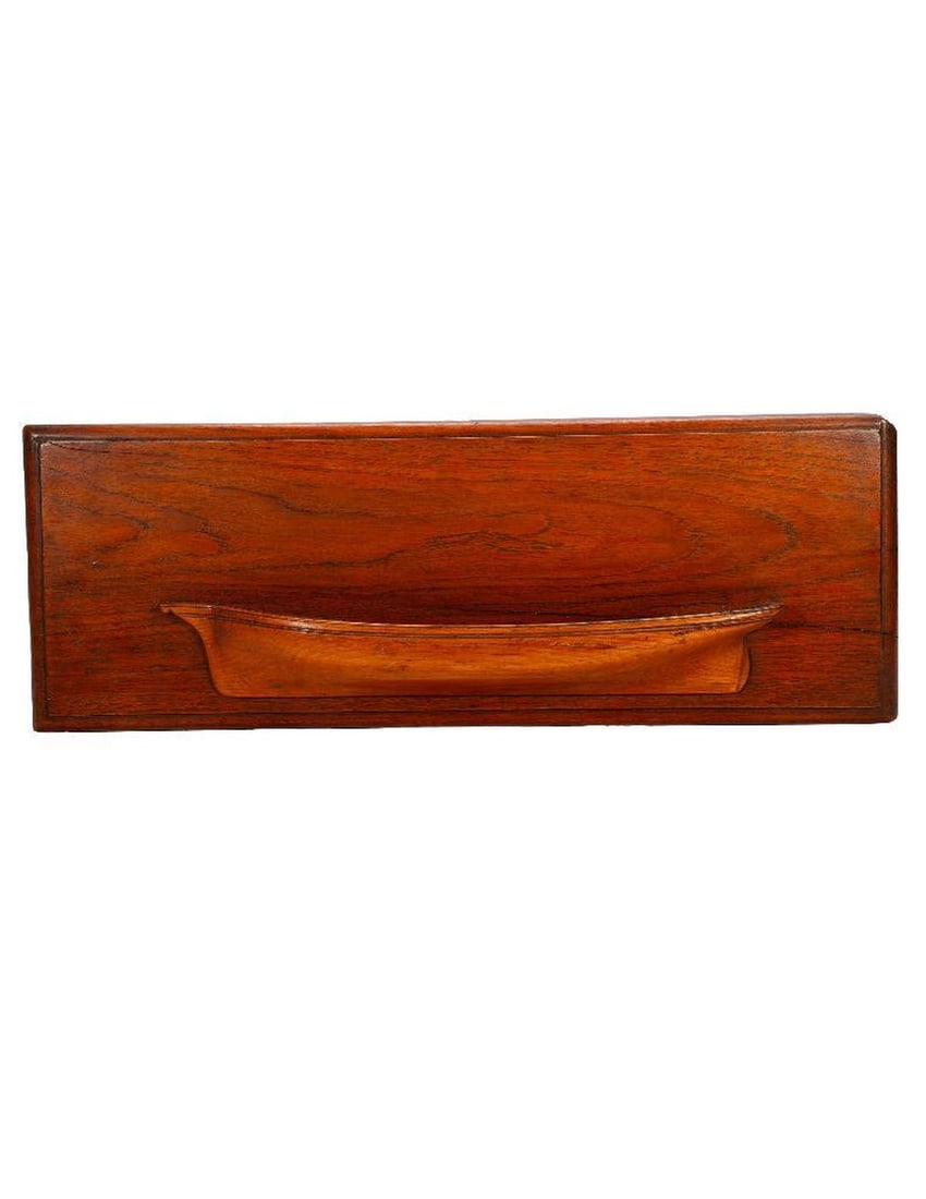 Carved Half-Hull Ship Model.: Circa 19th Century. A half-hull ship model formed of a single piece of carved wood, mounted on a wood panel. Ship approx. 15 1/2" long; panel 7 3/4" x 22 inches. Condition: overall good; some nicks an