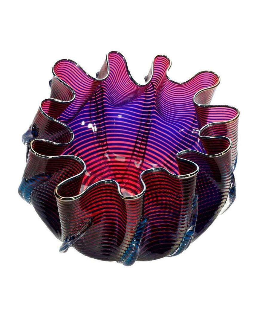 Murano Glass Ruffled Bowl.: The purple and blue-striped glass bowl shaped in a ruffled form. Unsigned. Approx. 6" H x 8" W. Good condition.