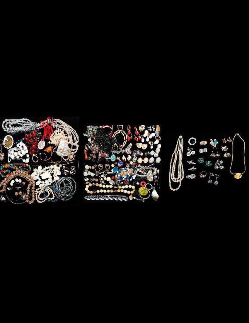 A group of costume jewelry: Approximately 100 pieces, including a Jomas scallop necklace, Boucher, Coro, Trifari, Van Dell, and Marvella (void some rhinestones)
