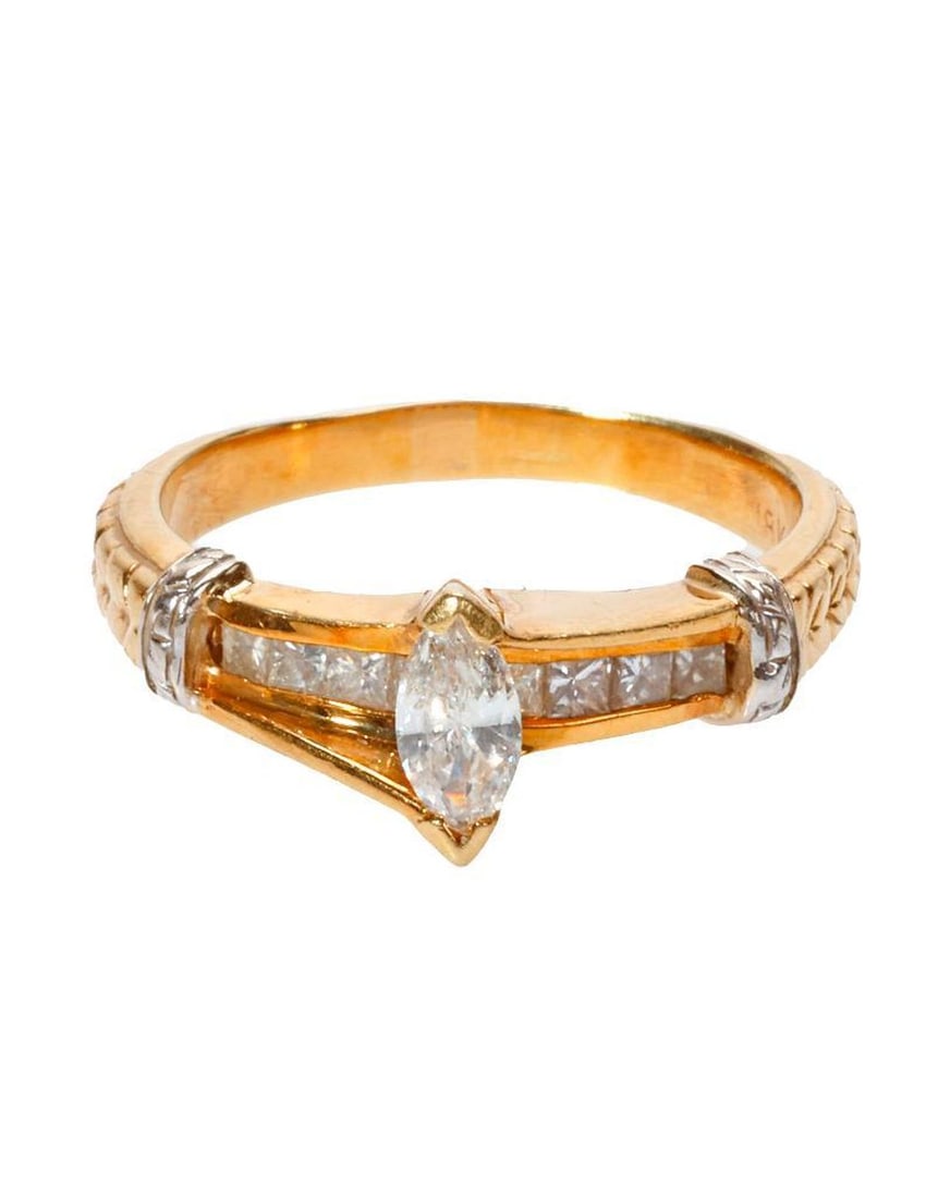A diamond and 14k bi-color gold ring (1 of 2)