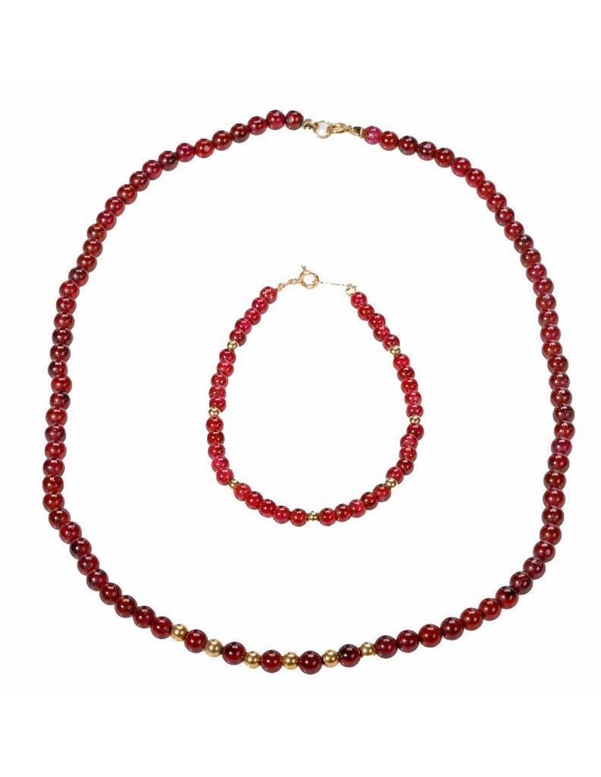A garnet and 14k gold bead bracelet: together with a garnet bead and gold-filled necklace, beads measuring approximately 5.20 -4.20mm; gross weight: 29.5 grams; lengths: 7 1/4 and 17 in.