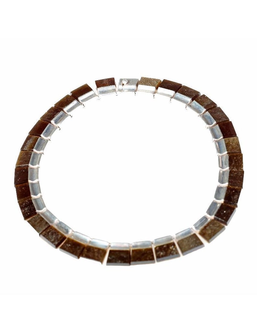 Enrique Ledesma, an obsidian and silver necklace: Taxco Mexico, the link necklace with rectangular obsidian and sterling silver links; ref. #247 SF; weighing approximately 61.3 grams; length: 14in.