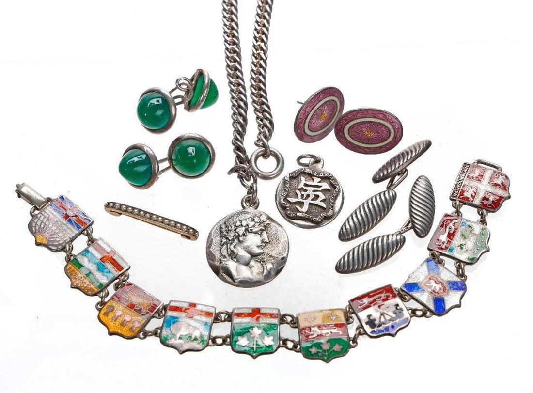 A group of silver jewelry (1 of 3)