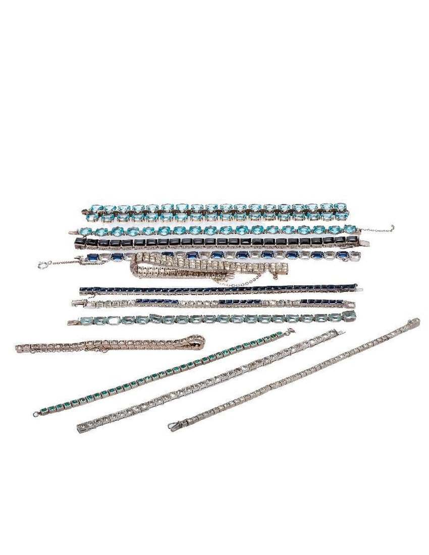 A group of vintage rhinestone and silver bracelets: makers including Trifari, Diamonbar, Otis, H&H, Germany