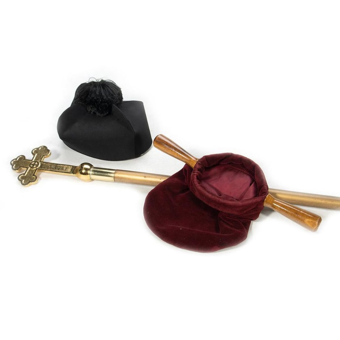 A Roman Catholic Clerical Biretta, Staff, and Bag: Biretta with processional staff and collection bag. Biretta 5in. h. 9in. d Staff 42in.