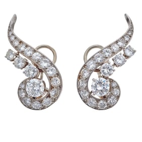 A pair of diamond, platinum and 18k white gold ear clips, French