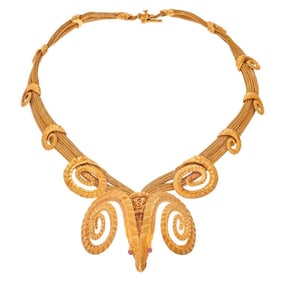 A 14k gold ram�s head necklace