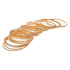 A group of gold bangle bracelets