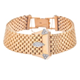 A diamond and 14k gold bracelet