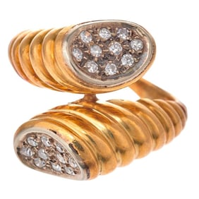 A diamond and 18k gold ring