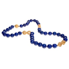 A lapis and 18k gold necklace, retailed by Laykin & Cie