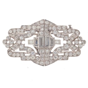 An art deco diamond and platinum double clip-brooch