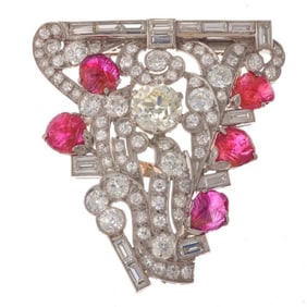 A diamond, ruby and platinum clip brooch