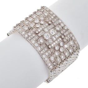 A diamond, seed pearl, platinum and white gold bracelet