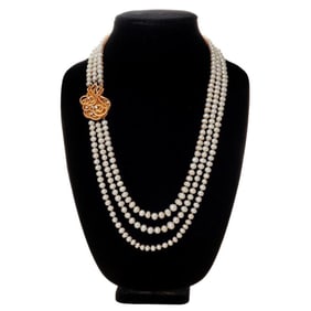 A freshwater cultured pearl, diamond and 18k gold necklace