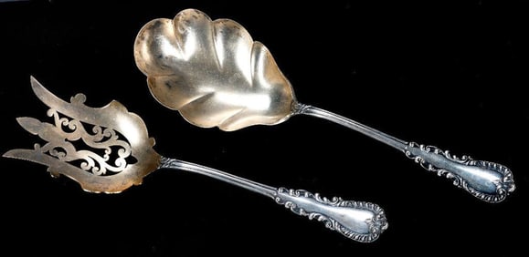 A Pair Silver Scrolling Motif Serving Pieces