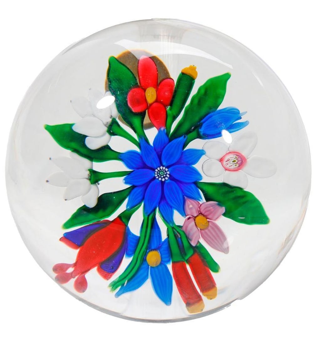Saint Louis Mixed Bouquet Paperweight, 1981: A Saint Louis, France art glass paperweight with blue central flower and pink, red, and white surrounding. Approx. 1 3/4" x 3". With "SL" cane signature, dated 1981. Good condition, no chips/cracks.