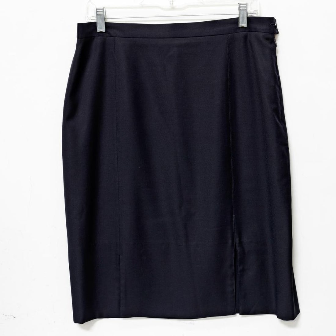 Three Designer Skirts, Escada, Armani, and Louis Feraud (Sz 12): An Escada Margaretha Ley labeled pure wool skirt with low slit panels front and back; Georgio Armani Le Collezioni Made in Italy silk blend straight skirt; and Louis Feraud 100% silk straight skirt. A