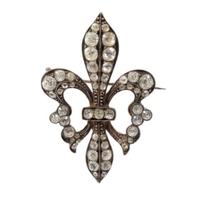 A 19th c. silver and paste fleur-de-lis brooch